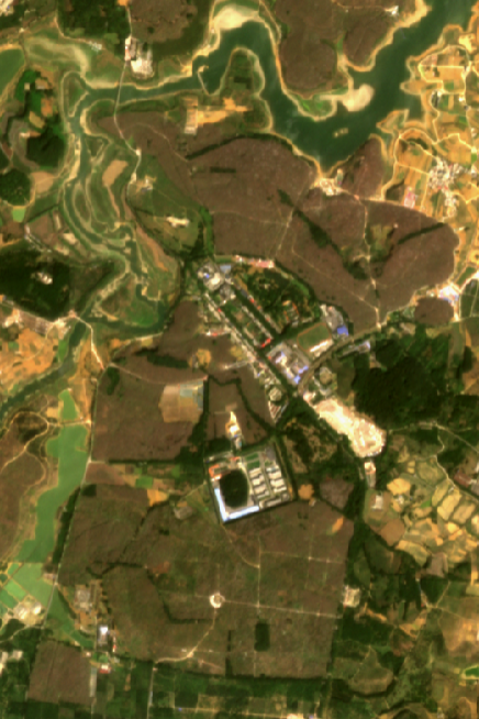 A satellite image showing pink verssus green terrain