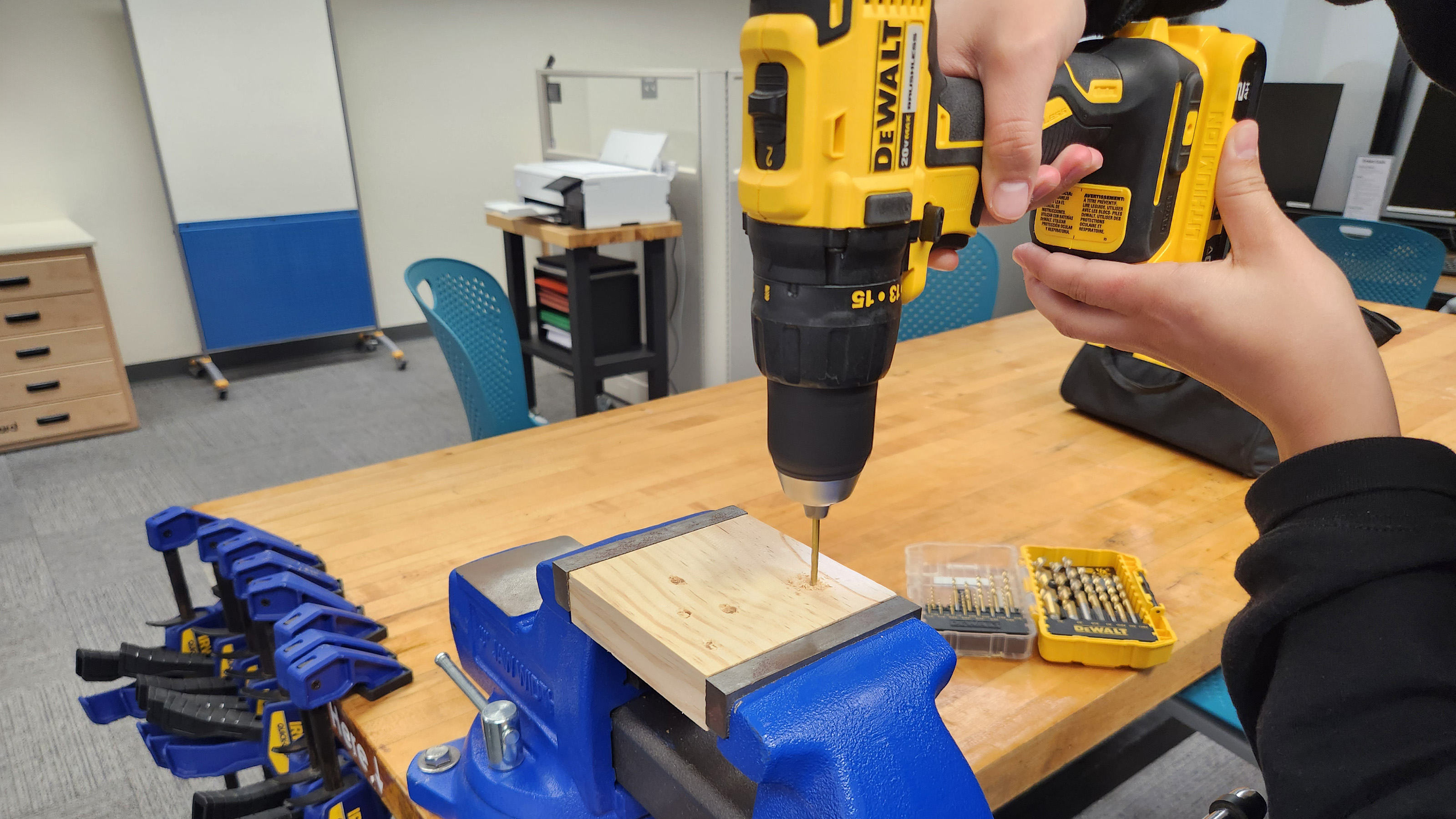 Powered hand drill in action