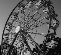 Black and white photograph of a Ferris wheel by Trevor Auldridge-Reveles.